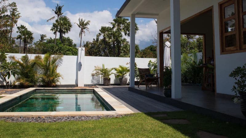 Villa in Amed with manicured grass and clean swimming pool