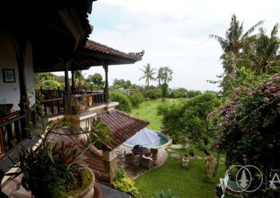 Beach front villa in Amed looking over the garden towards the Bali Sea.