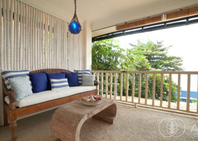 Seating area on the 2nd Floor of a beachfront house in Amed overlooking the Bali Sea.